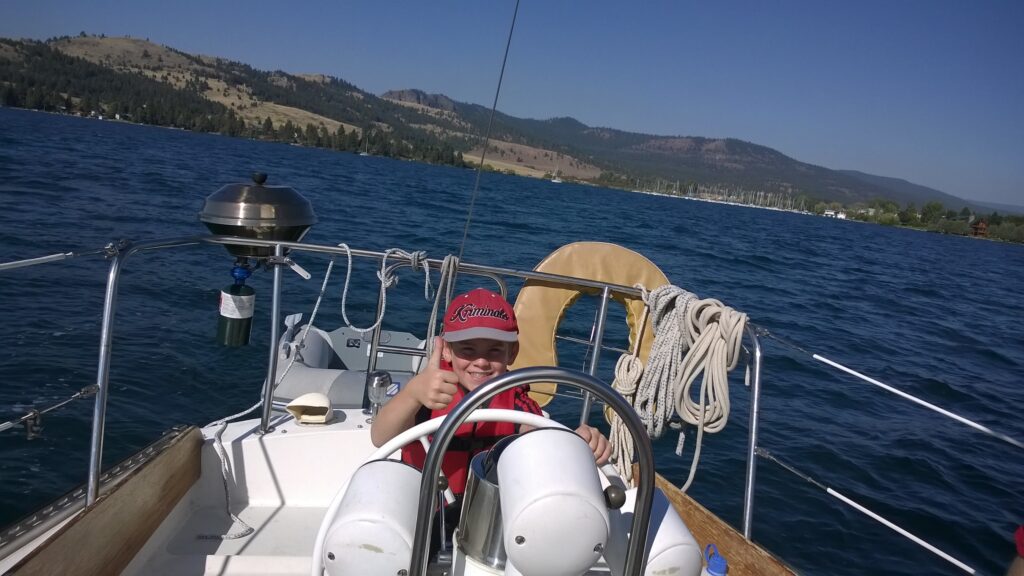Getting to pilot the sailboat is an experience every kid will remember forever.